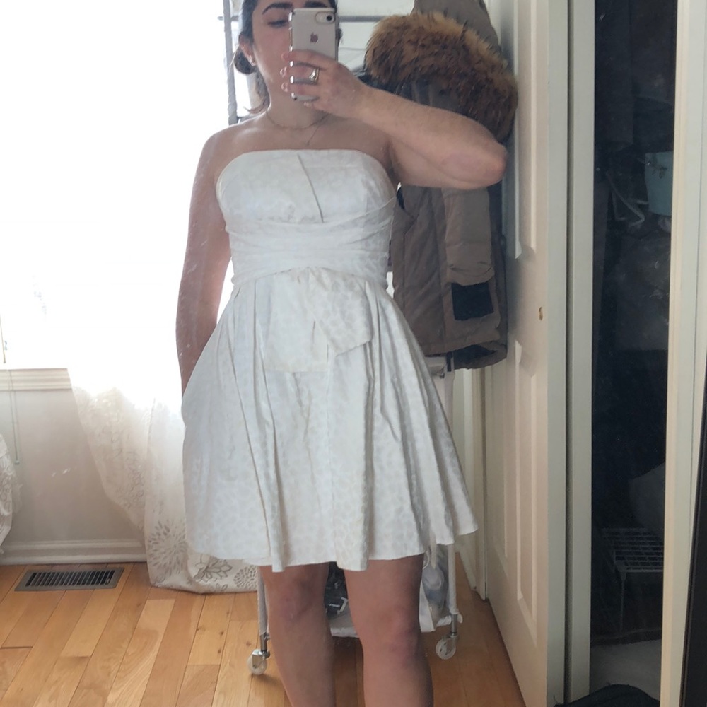White Cheetah print Bebe cocktail dress.